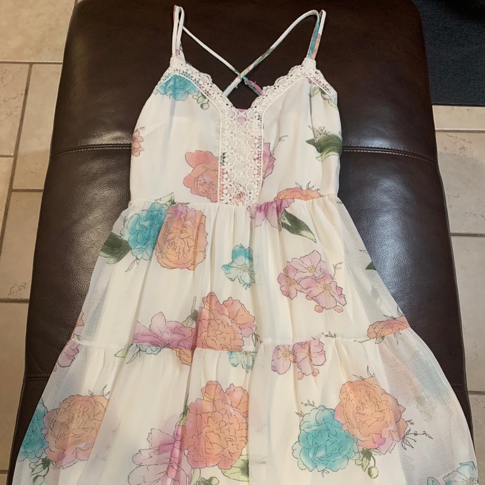White summer dress with pastel color flowers